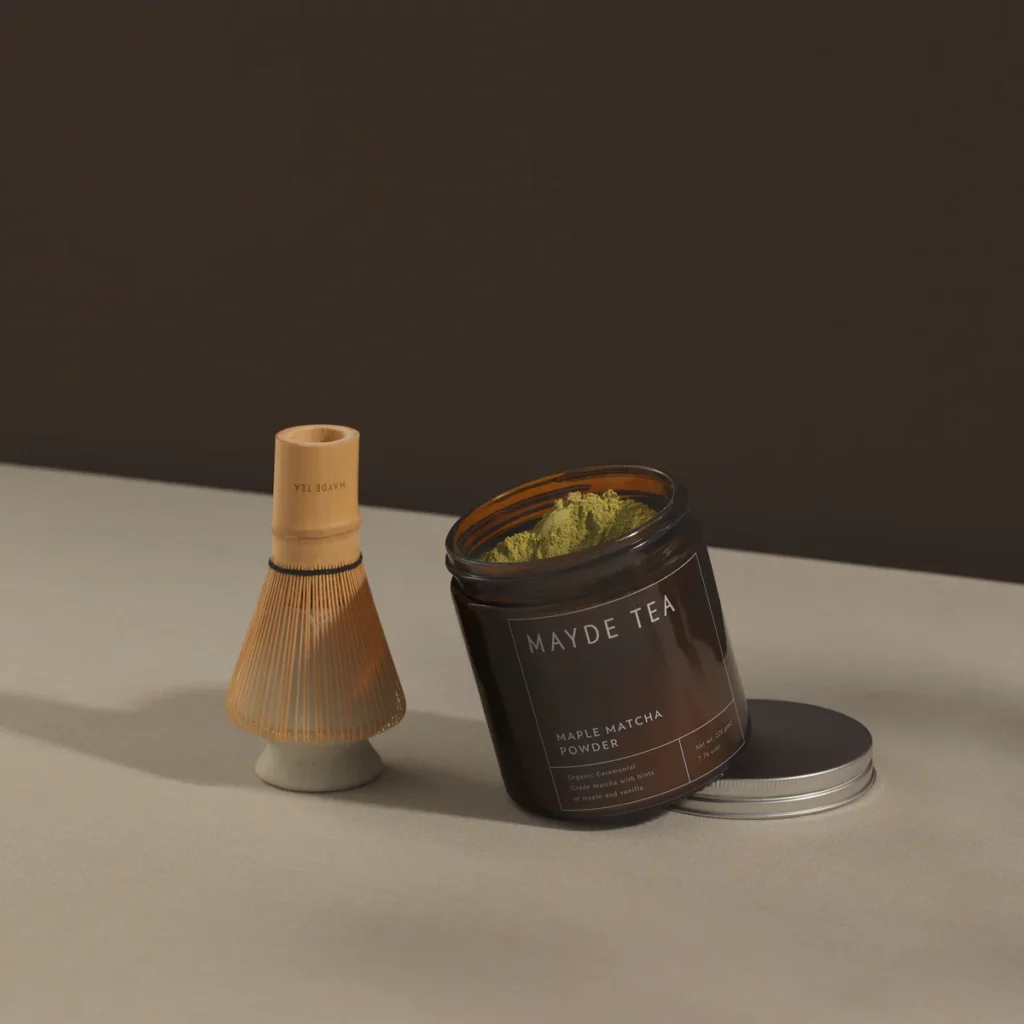 Open jar of maple matcha powder